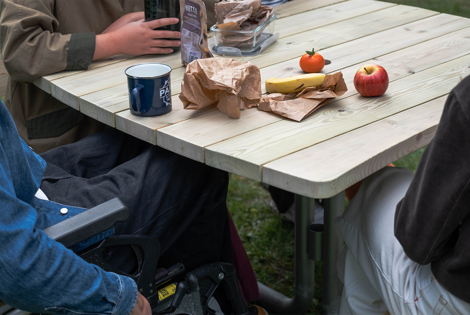 Close up of a wheelchair user's access under the table